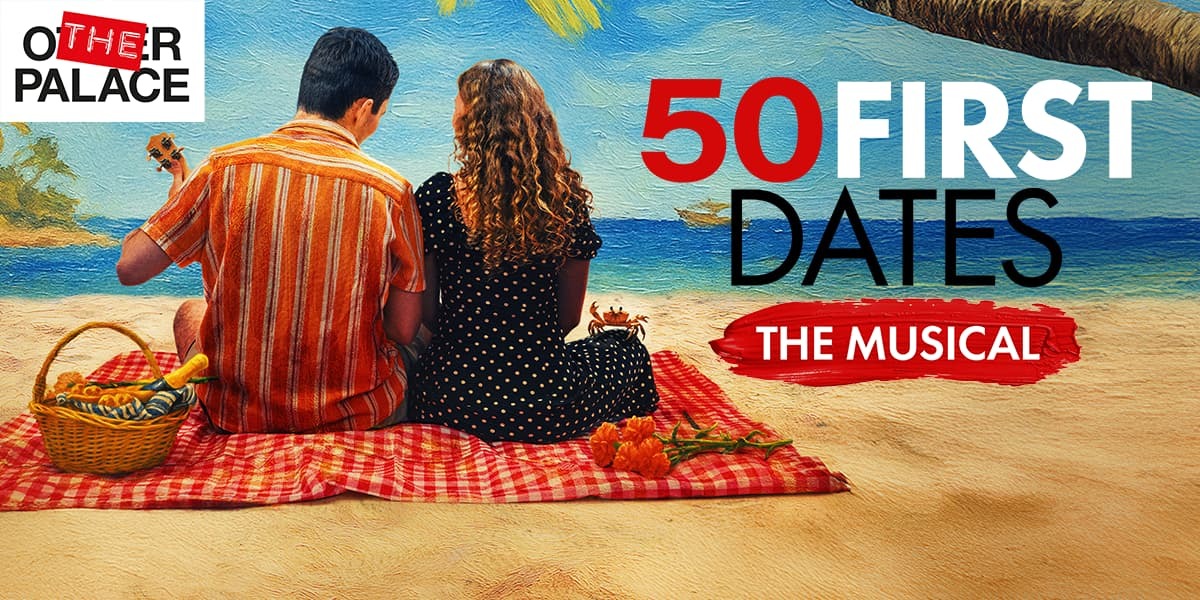 50 First Dates. A couple are sat on a beach looking out to the ocean
