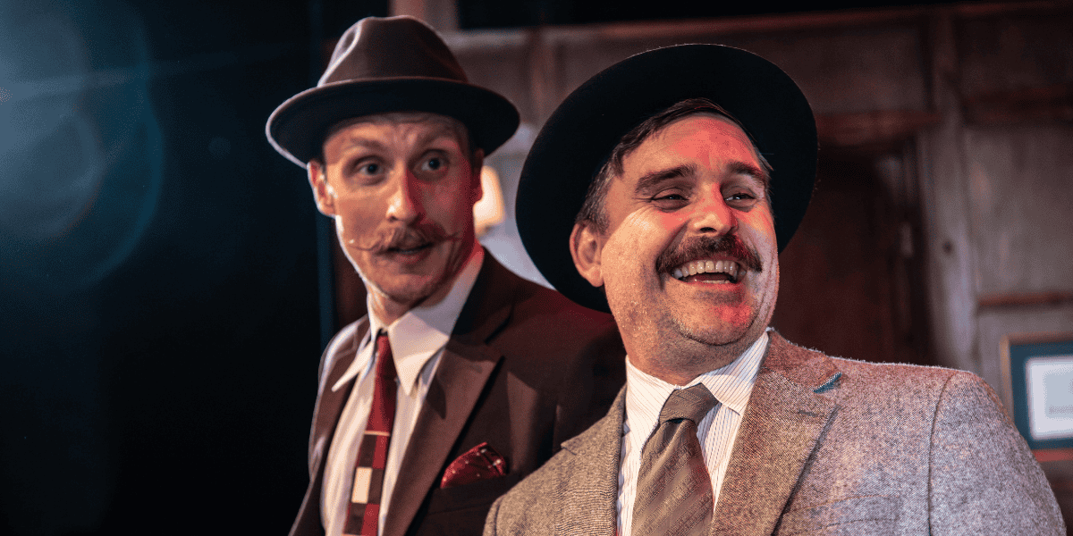 Show: A Shoddy Detective & The Art of Deception Image: Two detectives 