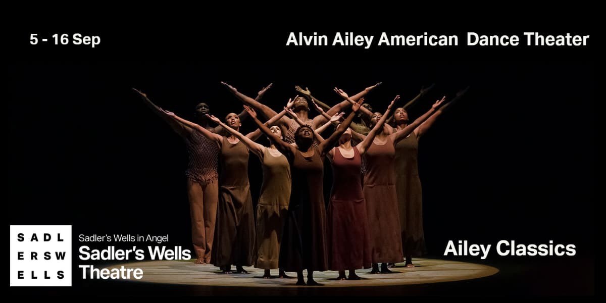 Text: Alvin Ailey American Dance Theater Ailey Classics. Image: A group of dancers raise their arms in the air against a black background. 