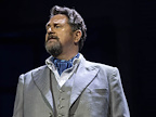 Michael Ball wearing a suit and cravat.