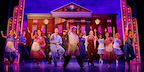 Back To The Future The Musical in London. Goldie Wilson and the ensemble are dancing in front of the Town Hall.