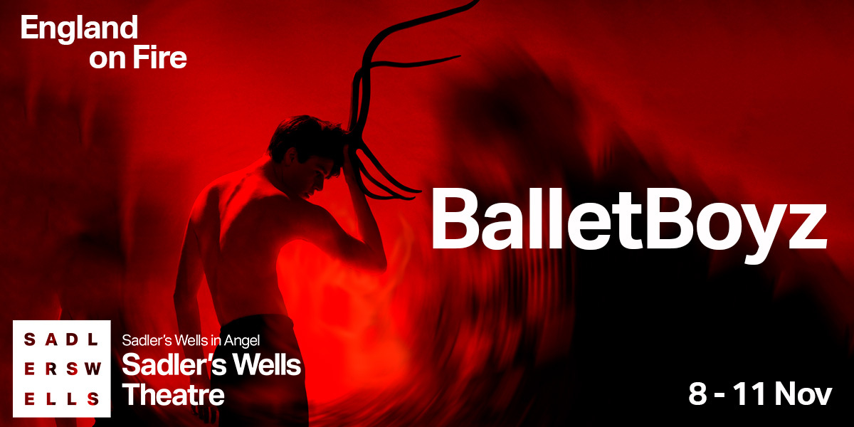 ext: BalletBoyz England On Fire. Image: A red blurred background with a person standing in front