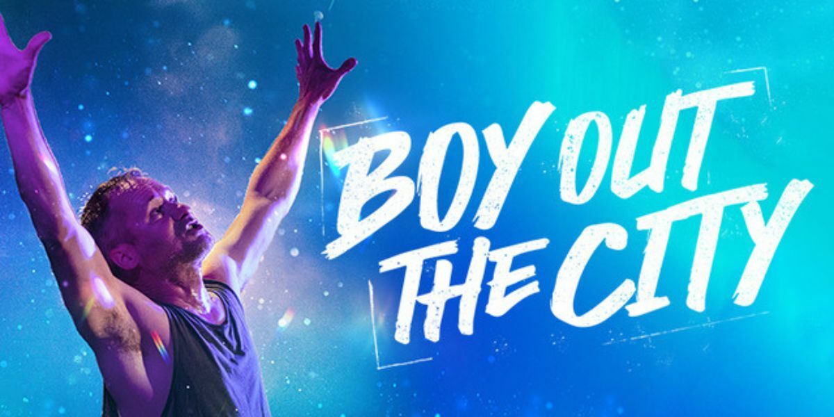 Text: Boy Out The City, image: man against a blue background.