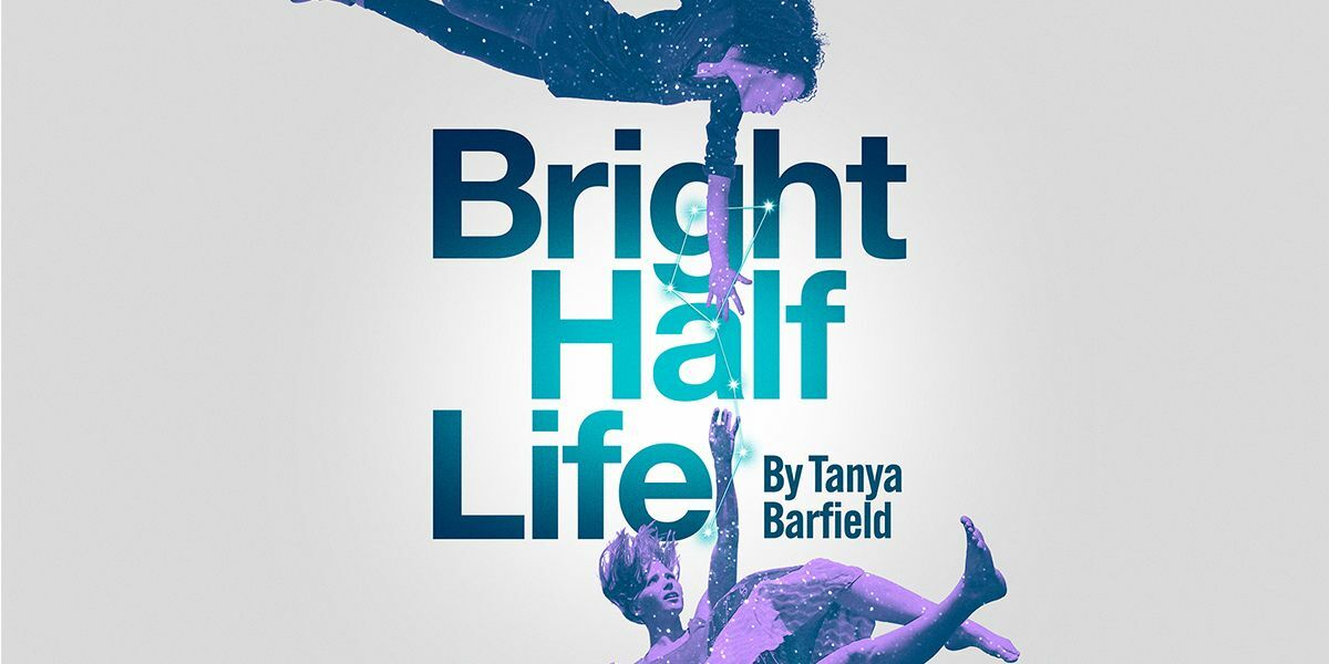 Text: Bright Half Life. By Tanya Barfield. | Image: Two people are falling. One at the top of the image and one at the bottom of the image. They are reaching out to each other with a star constellation around their hands.