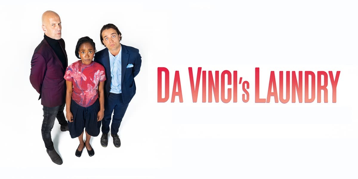 A woman and two men stand, looking up to the camera. The background is completly white, to the righthand side of them, in orange and red gradient writing, reads: Da Vinci's Laundry