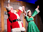 Father Christmas celebrating and cheering
