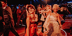 Photo by Luke Dyson - highschoolers in fancy dresses at a school dance