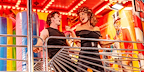 Photo by Danny Kaan - Sandy and Danny in front of neon lights