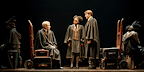 Scorpius, Rose and Albus are among school trunks, wearing their school robes.