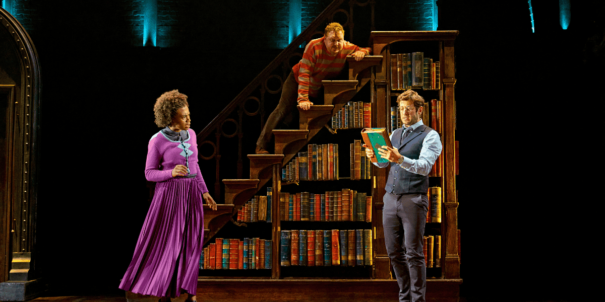 Image: Harry Potter, Hermione Granger, and Ron Weasley stand in the library while reading a book Show: Harry Potter and the Cursed Child