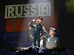 Spitting Image Puppet of Vladimir Putin in front of a sign which spells out the word Russia