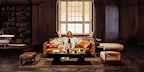 Show: Interview at Riverside Studios Image: A woman seated on a sofa in her living room, facing toward the stage.