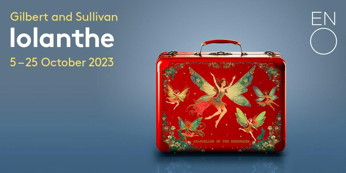 Text: Gilbert and Sullivan Iolnathe 5-25 Oct 2023. Image: Red suitcase with images of fairies on it.