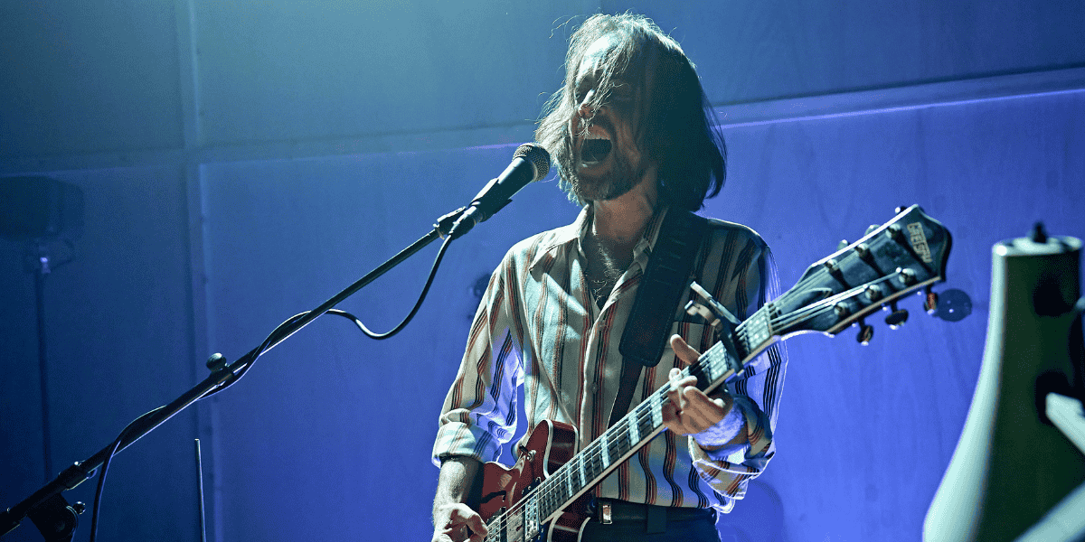 Image: Jack Holden playing guitar Show: Kenrex