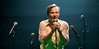 Image: Jack Holden surrounded with microphones Show: Kenrex