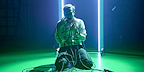 Image: Jack Holden on the floor tangled in electrical wires Show: Kenrex
