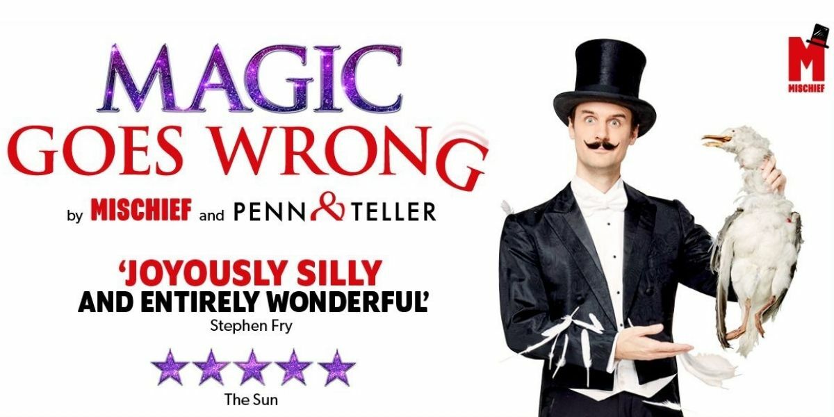 Magic Goes Wrong. Apollo Theatre. Magician holds a bird. 