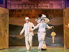 Production image of Mother Goose with Ian McKellen and John Bishop.