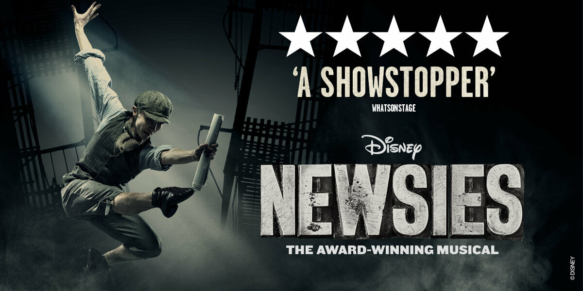 5 Stars TEXT: "A Showstopper" WhatsonStage Disney Newsies, The Award Winning Musical.   Image: A cast member of Newsies jumping with a scroll in their hand.