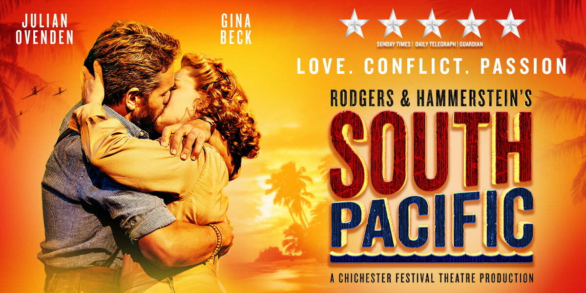 A man and woman embrace in a passionate kiss. The background is the colours of sunset with palm trees and war planes. 5 stars Rogers & Hammerstein's South Pacific A Chichester Festival Theatre Production 