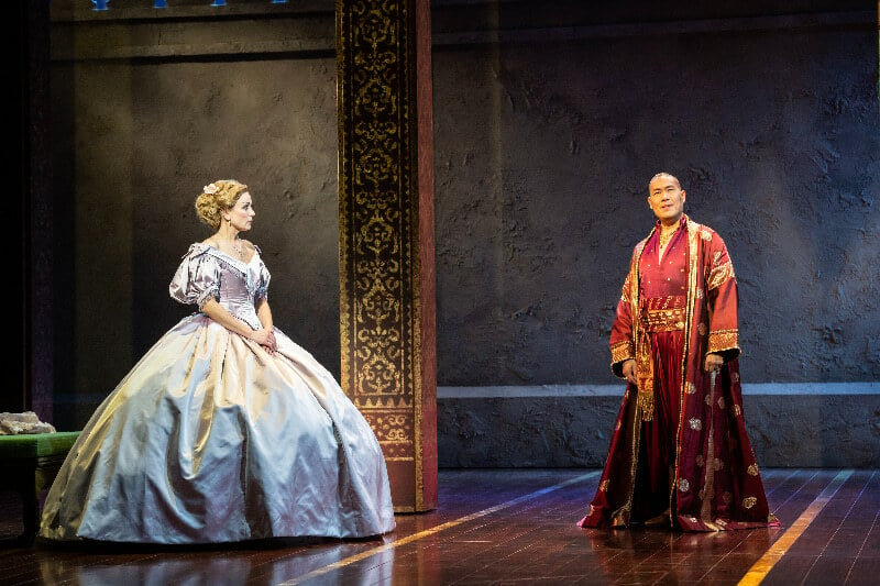 Helen George as Anna and Darren Lee as The King of Siam in The King and I
