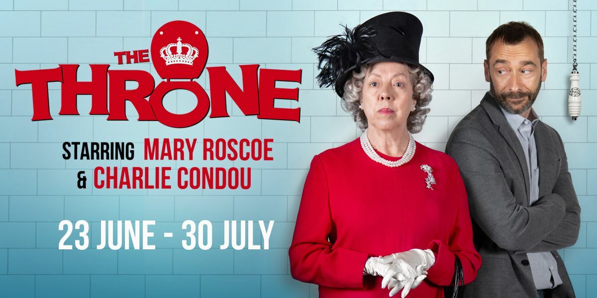 Text: The Throne, Starring Mary Roscoe & Charlie Condou, 23 June - 30 July. | Image: The background is light blue tiles and a lavatory chain hangs in the top right corner. Mary Roscoe is dressed as the Queen in a red dress with a black dress hat, complete with white gloves, pearls and a black handbag. Charlie Condou is dressed in a suit without a tie. He is turned to the side and looking to the 'Queen' who stands in front of him.