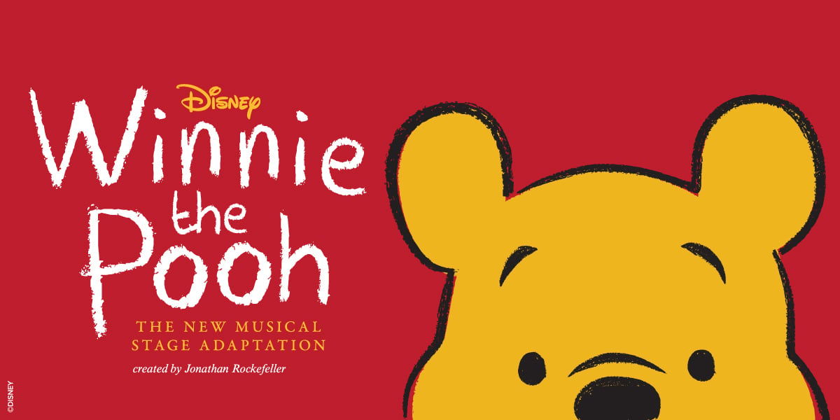 Text: Disney Winnie the Pooh. The new musical stage adaptation created by Jonanthan Rockfeller. Image: Red background with Winnie the Pooh's face.