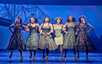 Production image of Company of Tina – The Tina Turner Musical with Aisha Jawando (Tina Turner) in TINA in London. | Photo by Manuel Harlan