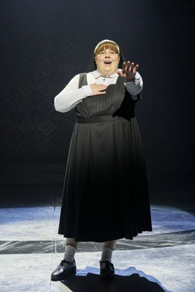 Production image of Lizzie Bea as Sister Mary Robert in Sister Act The Musical. | Photo by Manuel Harlan