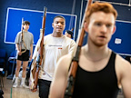 Rehearsals for From Here To Eternity. Cast members carrying weapons. Photo by Pamela Raith.