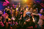Sarah Annakin (centre) & the cast of MAGIC MIKE LIVE, credit Matt Crockett