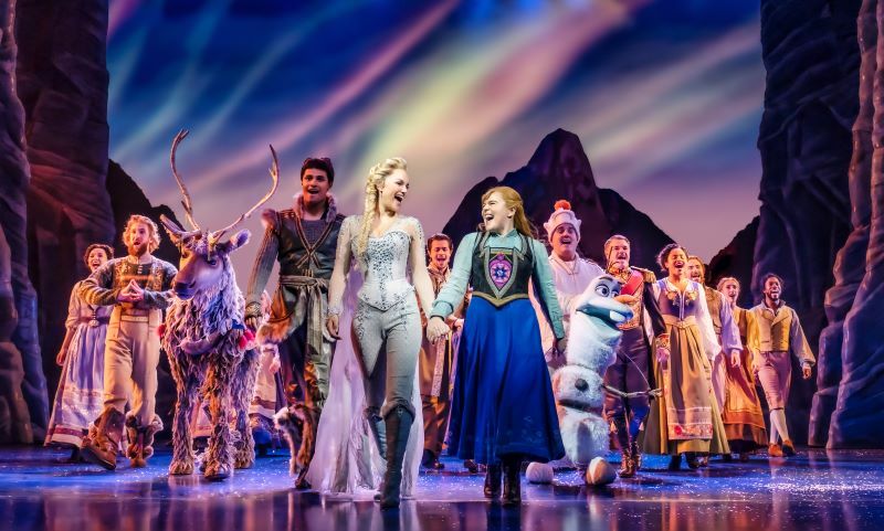 Ensemble, Richard Frame (Weselton), Samantha Barks (Elsa), Emily Lane (Anna)- Disney's Frozen the Musical - Photo by Johan Persson © Disney
