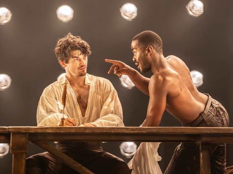 Ncuti Gatwa points a finger a Edward Bluemel in Born With Teeth