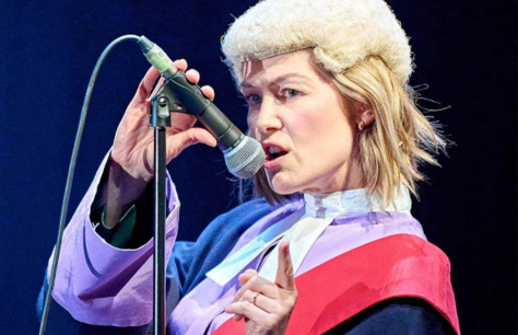 Rosamund Pike in a traditional judge